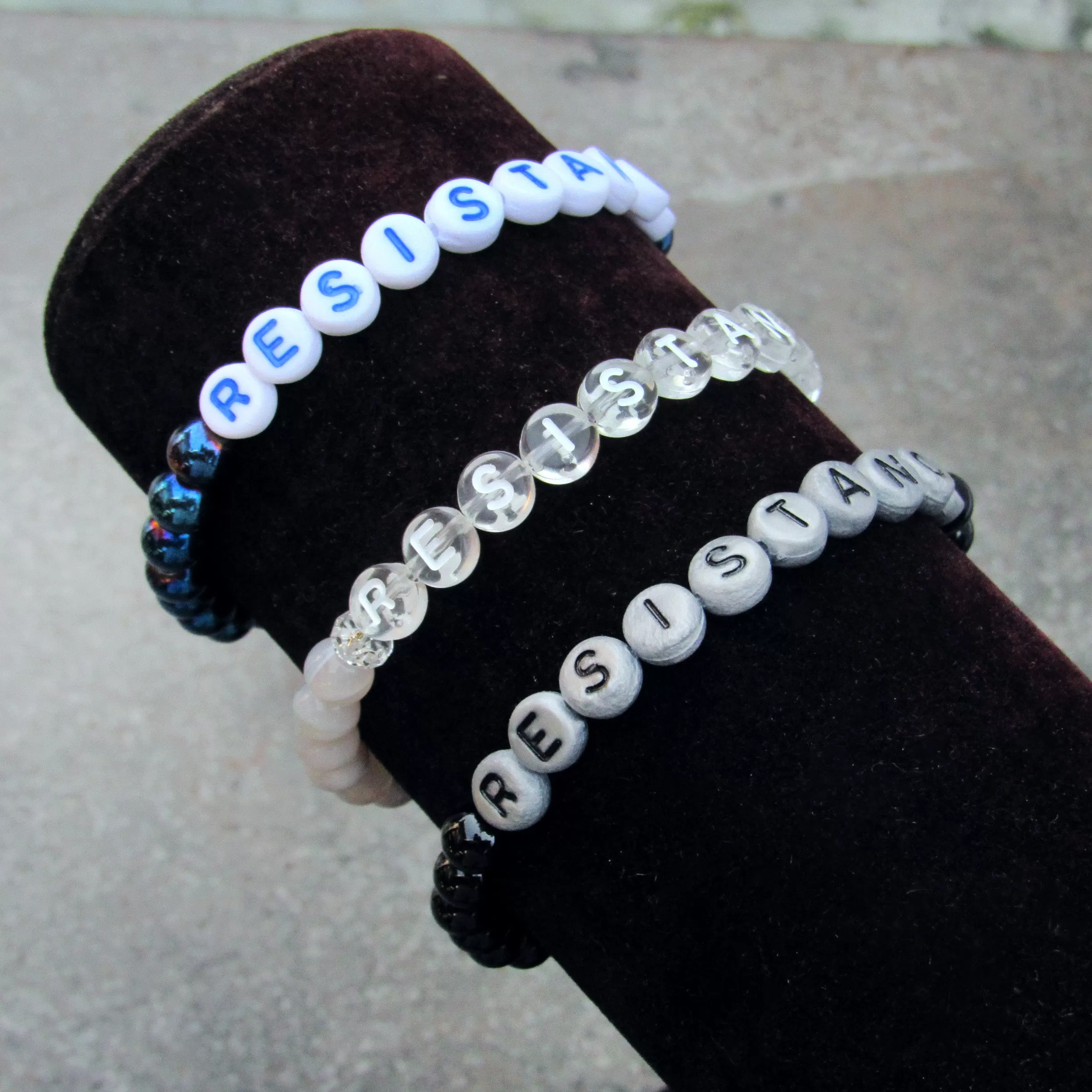 RESISTANCE bracelets in various sizes and gemstones