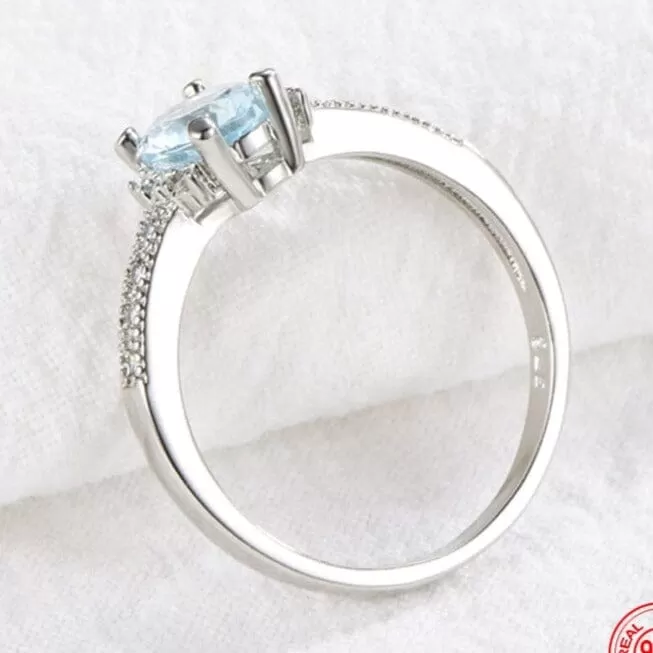 Silver Charm Oval Aquamarine Ring